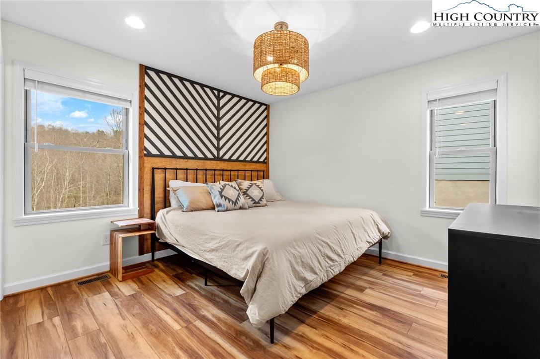 429 Townhomes Place, Unit 18 Boone, NC 28607 - Photo 17 of 25 a bedroom with a bed and a window