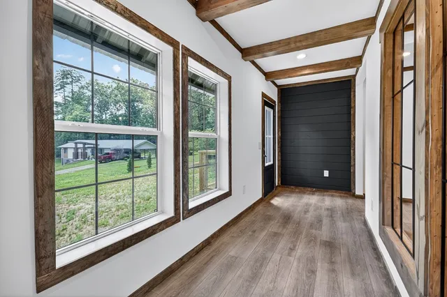 a view of entryway with wooden floor