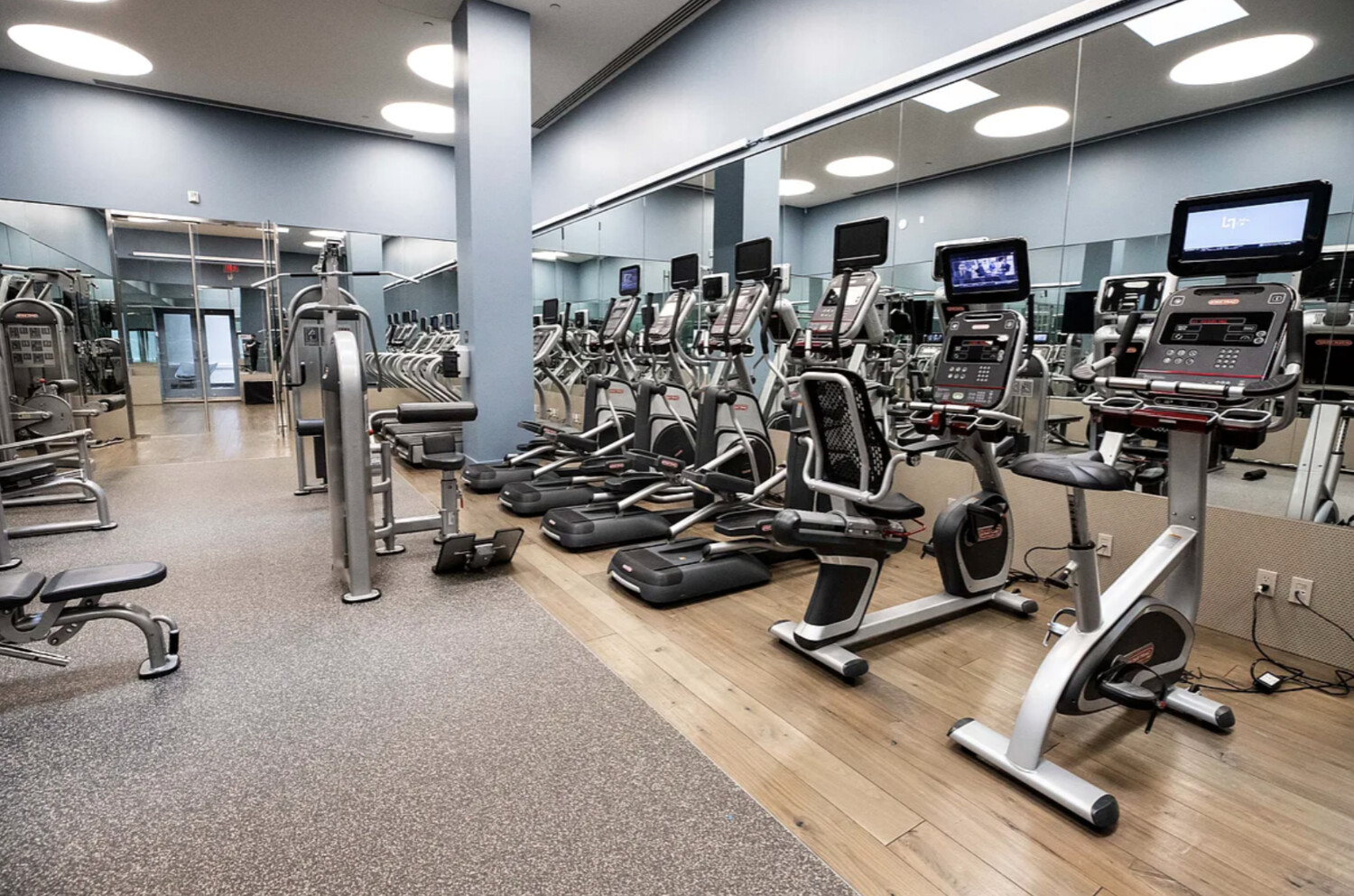 25 Broad Street, Unit 10K Manhattan, NY 10004 - Photo 7 of 12 a view of a room with gym equipment