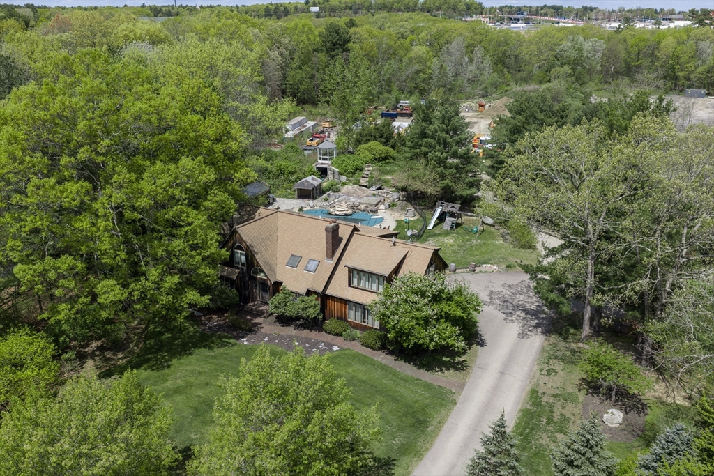 42 Pine Acres Road Foxboro, MA 02035 - Photo 33 of 40 an aerial view of a house with a yard and lake view
