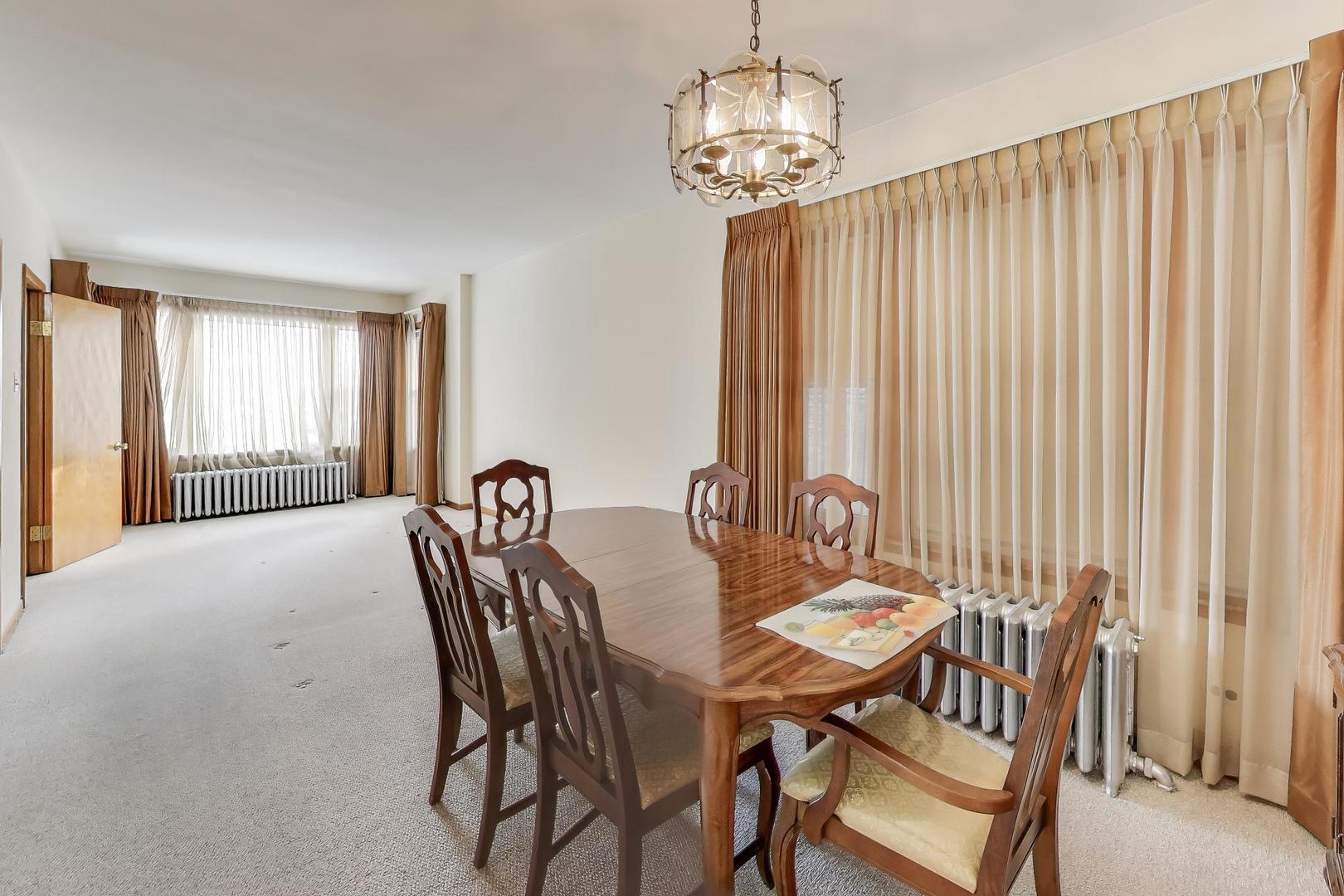 3958 South Rockwell Street Chicago, IL 60632 - Photo 5 of 38 a view of a dining room with furniture window and outside view