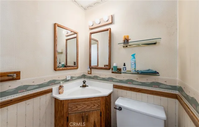 a kitchen with granite countertop a sink and a window
