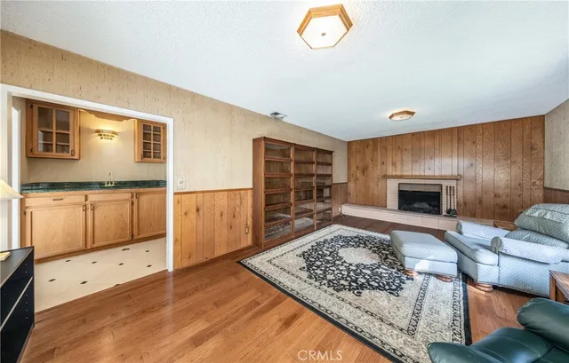 a bathroom with a sink a large mirror and a shower