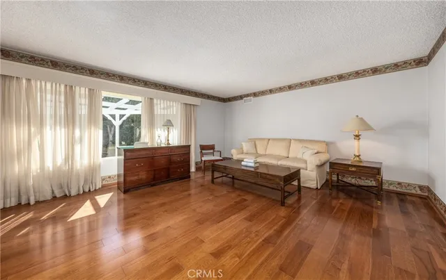 a kitchen with sink cabinets and stainless steel appliances