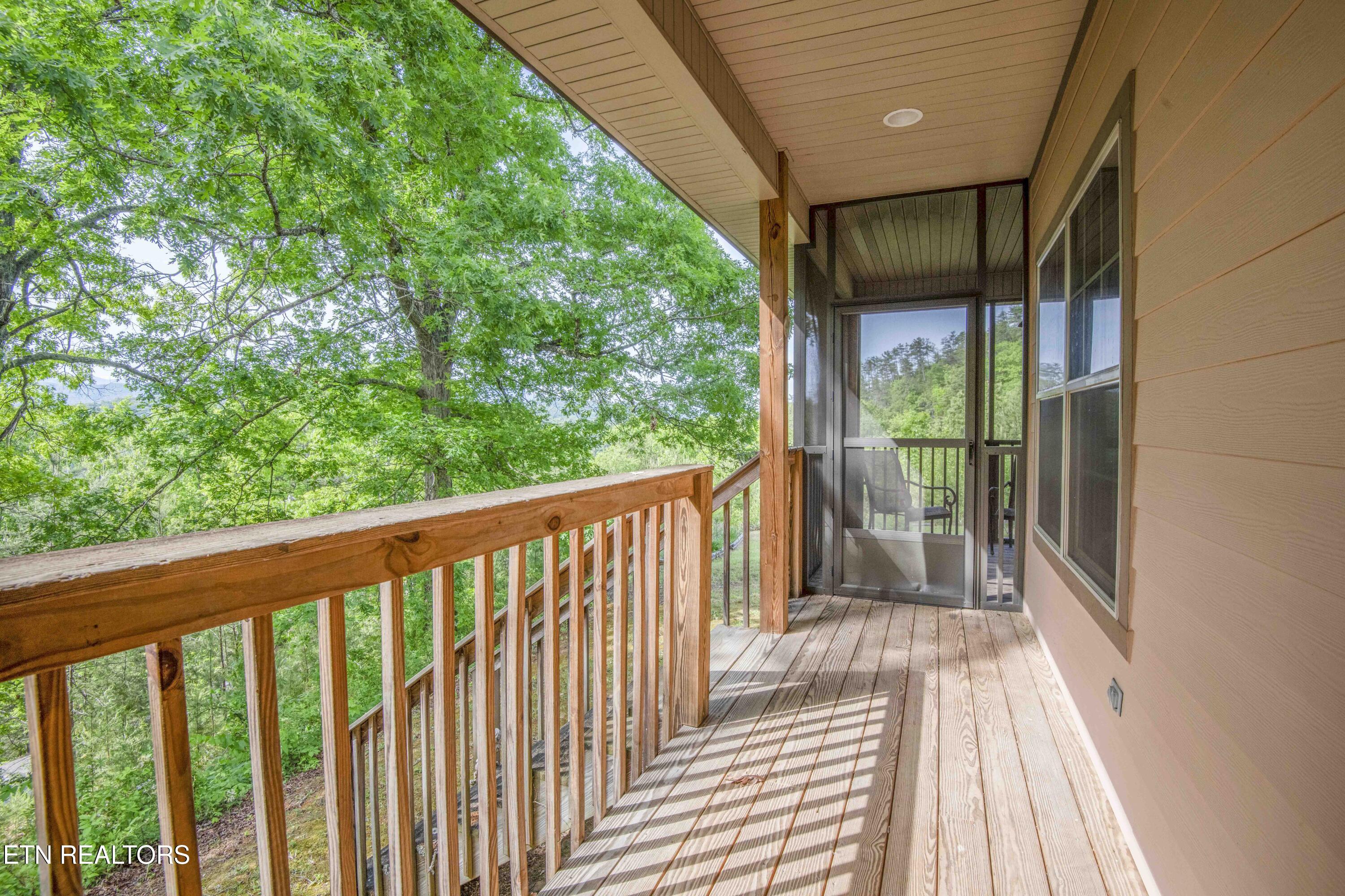 1033 Shell Mountain Road Sevierville, TN 37876 - Photo 13 of 60 Covered Side Porch