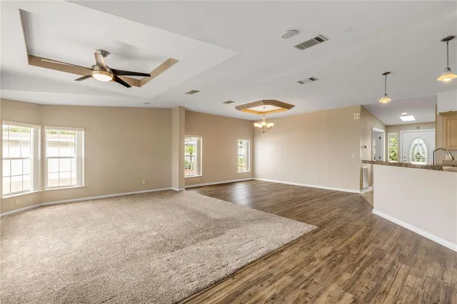 a kitchen with a sink cabinets and stainless steel appliances