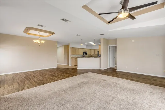 a view of a kitchen with a chandelier