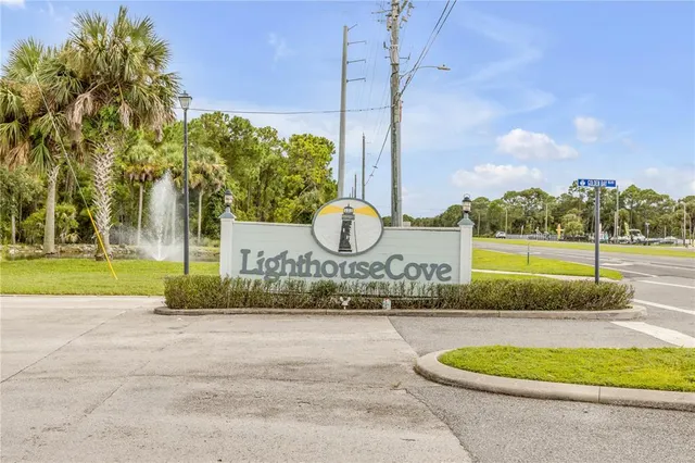 a park with lots of tress in front of it