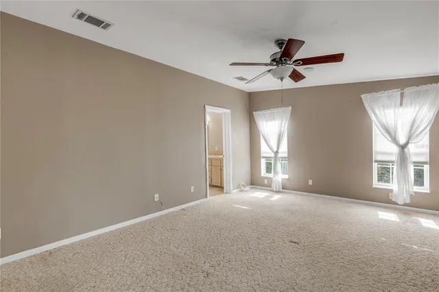 a bathroom with a sink a bathtub and a mirror