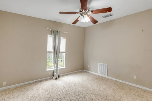 a view of a lake with a big yard