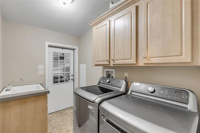a view of a balcony with wooden floor and fence