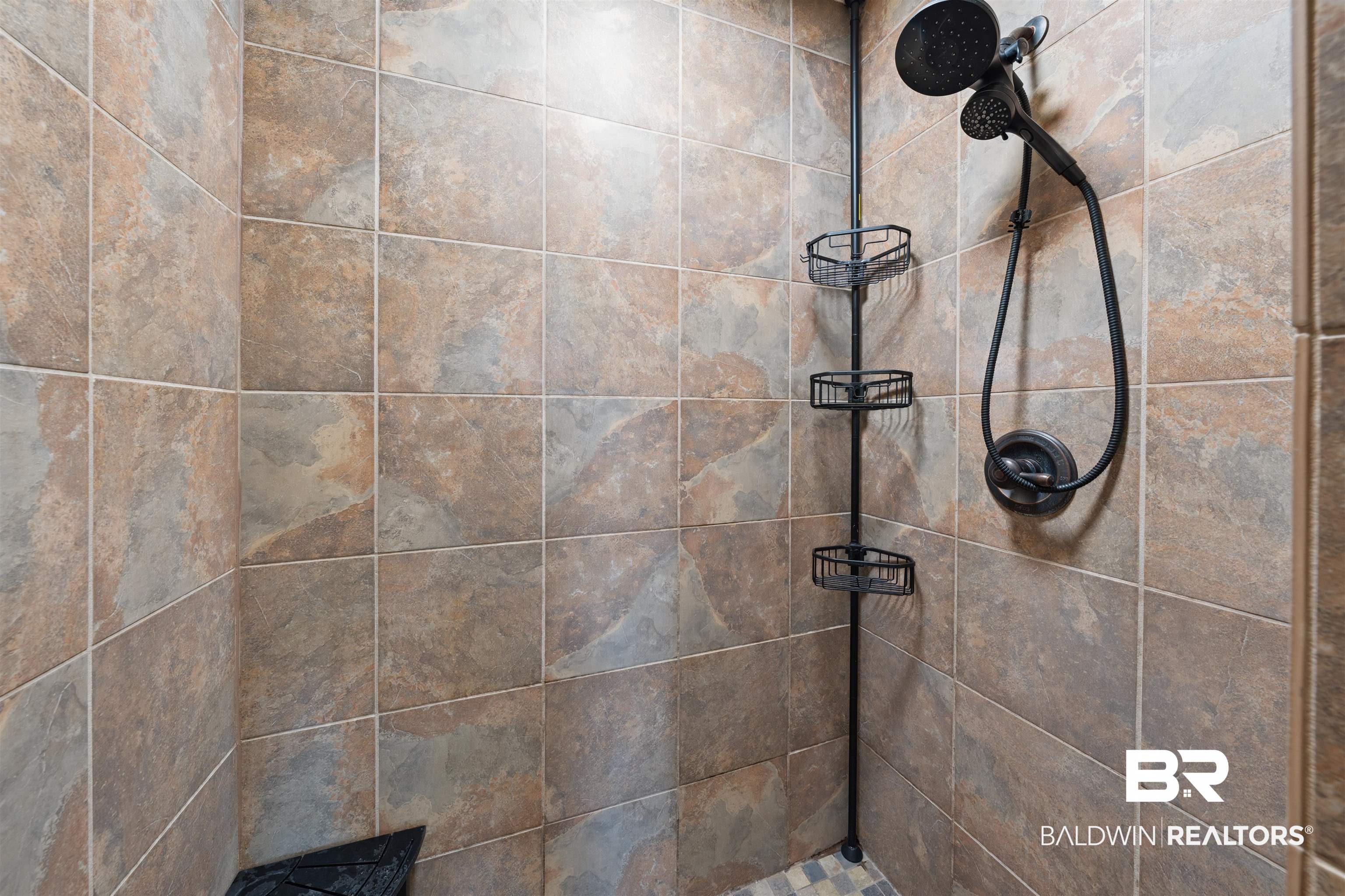 1430 Regency Road, Unit H202 Gulf Shores, AL 36542 - Photo 13 of 25 Bathroom view of a tile shower