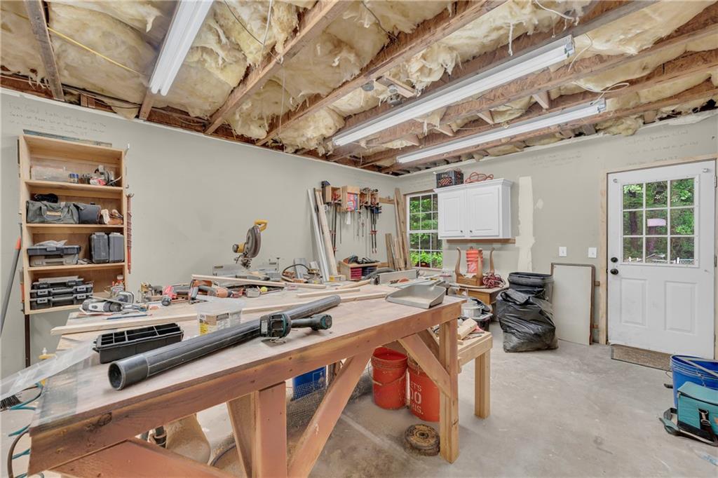 587-j B J B Owens Road Bethlehem, GA 30620 - Photo 69 of 99 a view of a kitchen with stainless steel appliances granite countertop a stove and a refrigerator
