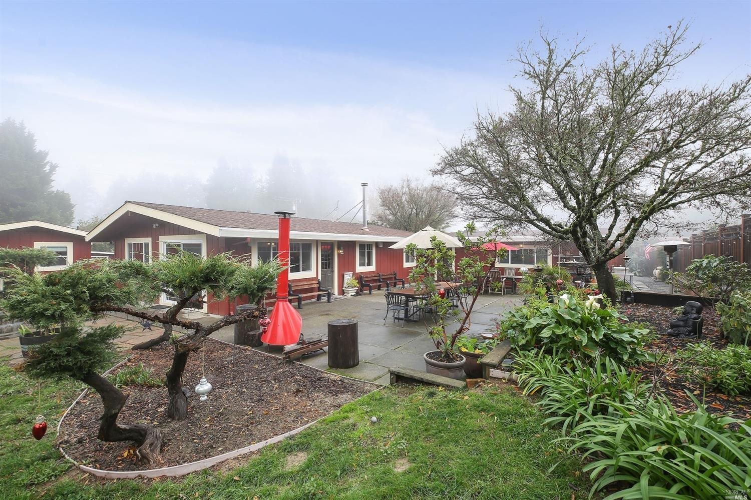 4155 Harrison Grade Road Sebastopol, CA 95472 - Photo 1 of 1 a view of outdoor space yard deck patio and fire pit
