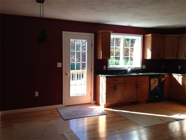 214 Pleasantdale Road Rutland, MA 01543 - Photo 3 of 14 a view of an empty room with window and wooden floor