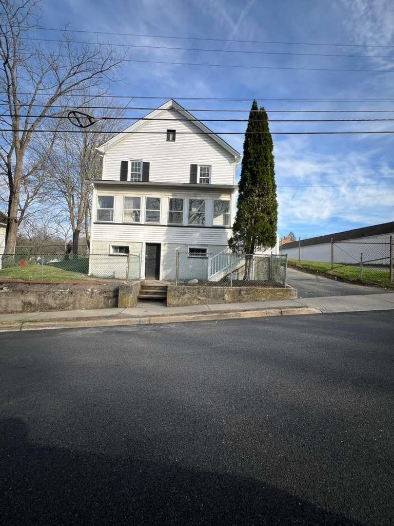 8 Hampton Street, Unit B Newton, NJ 07860 - Photo 6 of 7 a large building with a view of street