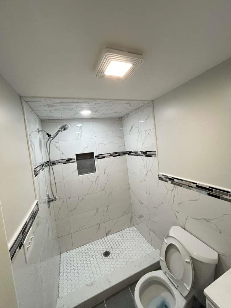 8 Hampton Street, Unit B Newton, NJ 07860 - Photo 7 of 7 a bathroom with a shower a toilet and sink