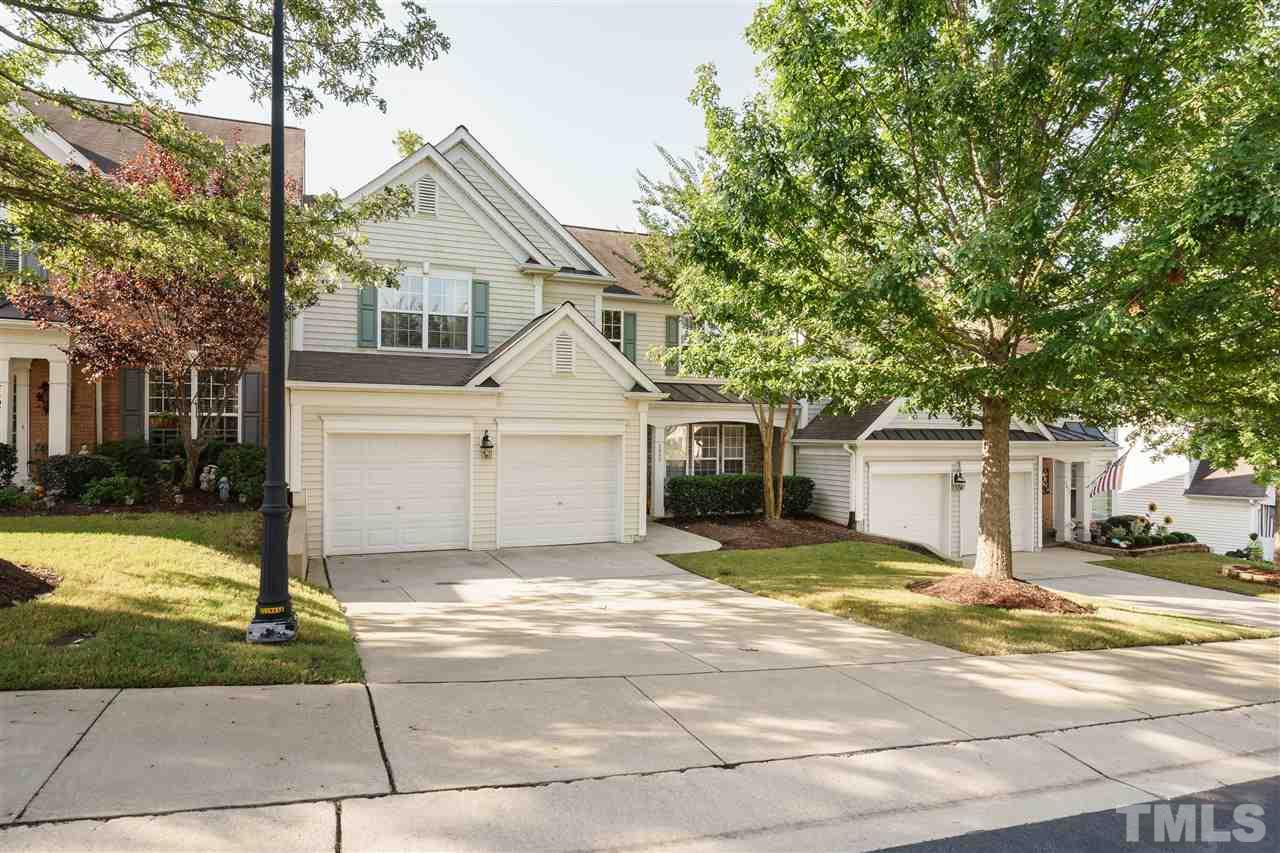 5409 Brandy Bay Road Raleigh, NC 27613 - Photo 1 of 25 a view of a white house with a yard and large tree