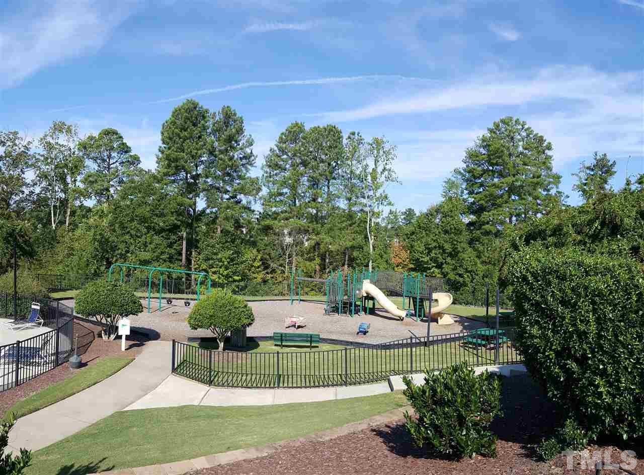5409 Brandy Bay Road Raleigh, NC 27613 - Photo 25 of 25 a view of a chairs and table in the garden