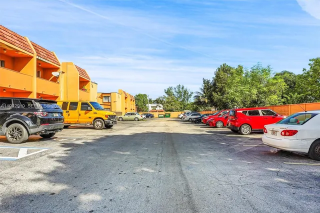 a view of a street with cars