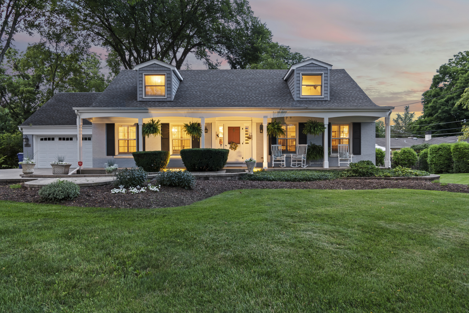 1713 East Thomas Road Wheaton, IL 60187 - Photo 2 of 55 a view of a house with a garden