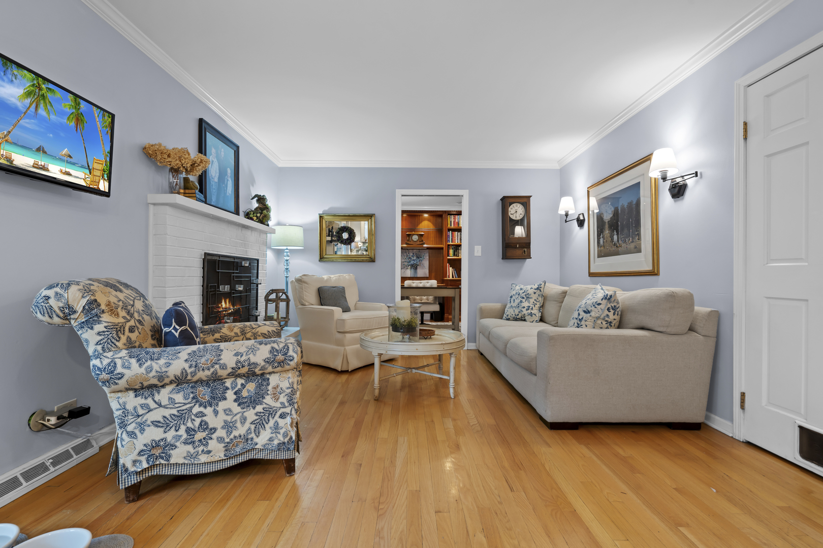 1713 East Thomas Road Wheaton, IL 60187 - Photo 22 of 55 a living room with furniture and a fireplace