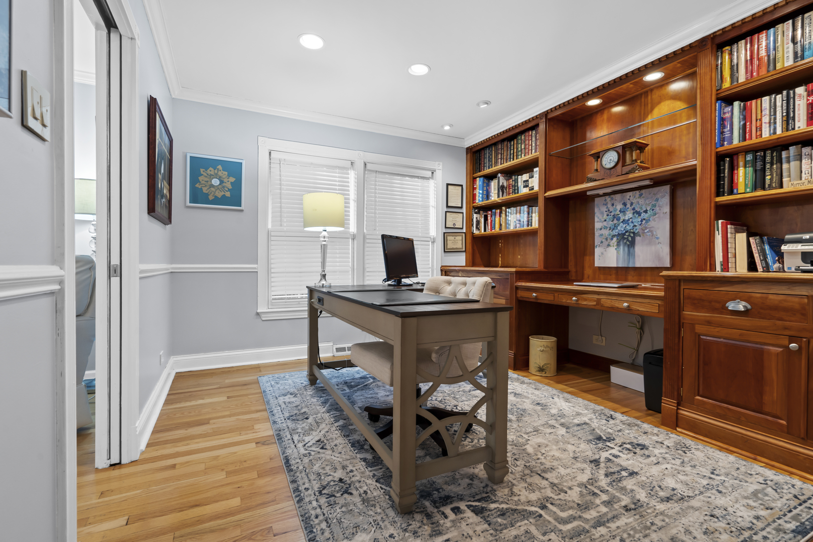 1713 East Thomas Road Wheaton, IL 60187 - Photo 24 of 55 a workspace with furniture bookshelf and a window