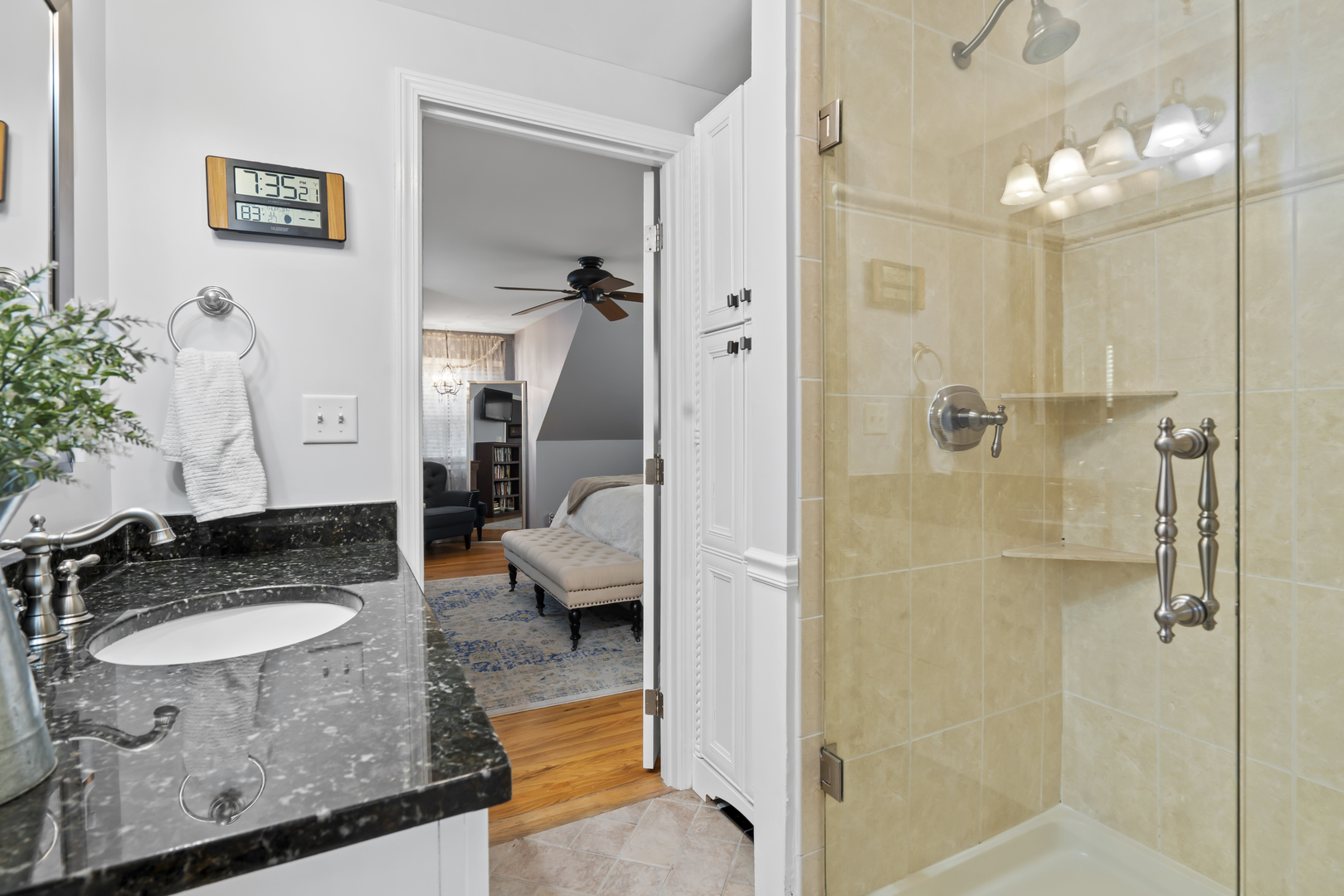 1713 East Thomas Road Wheaton, IL 60187 - Photo 30 of 55 a en suite bathroom with a granite countertop tub sink and mirror