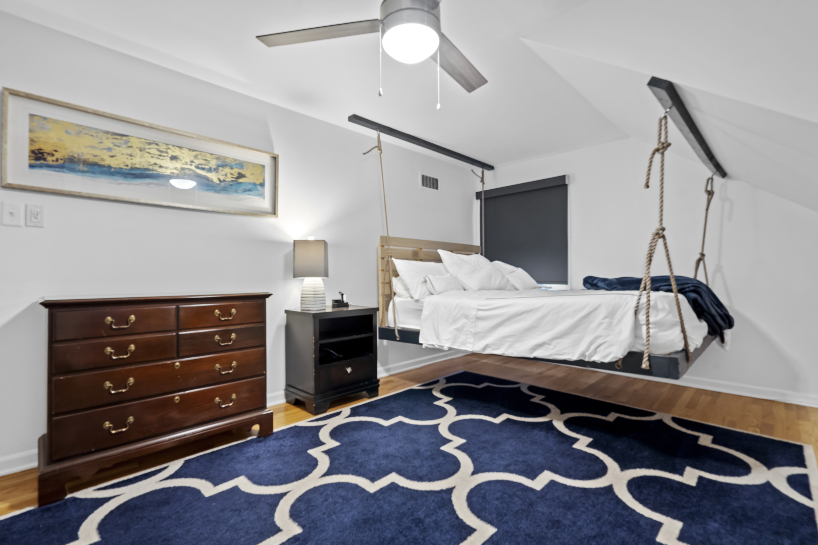 1713 East Thomas Road Wheaton, IL 60187 - Photo 33 of 55 a bedroom with a bed and a dresser