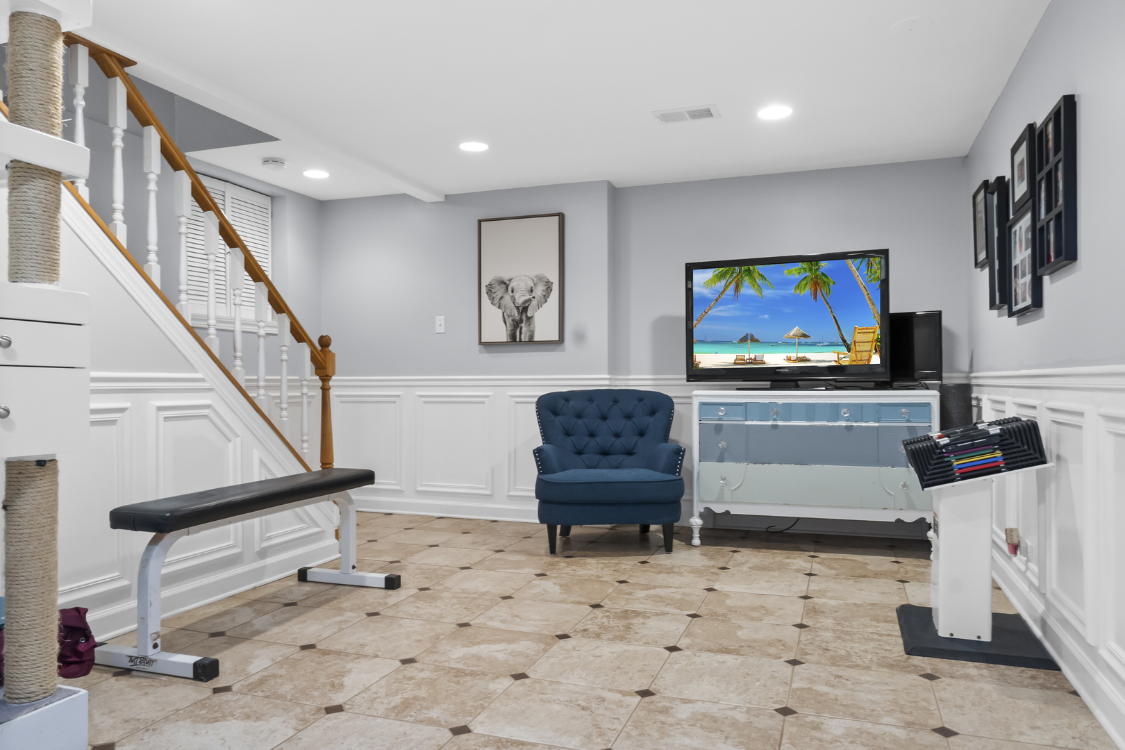 1713 East Thomas Road Wheaton, IL 60187 - Photo 38 of 55 a room with furniture and a flat screen tv