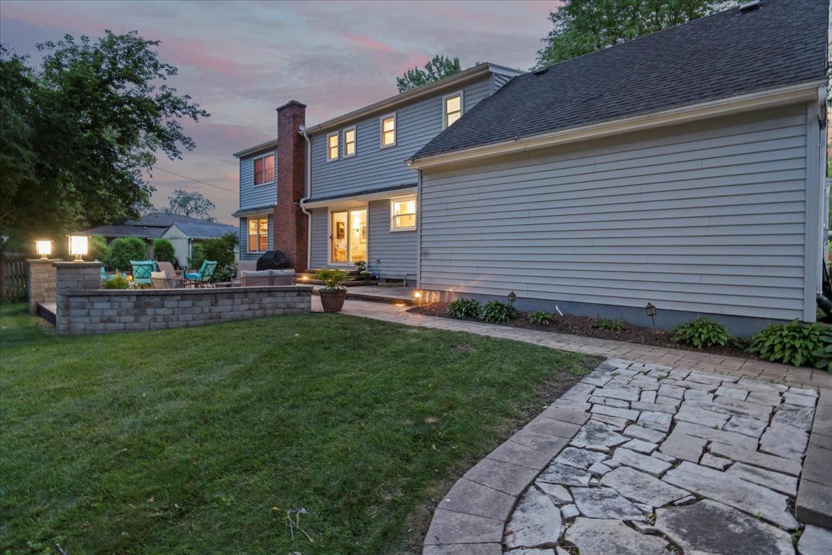 1713 East Thomas Road Wheaton, IL 60187 - Photo 52 of 55 a front view of a house with a garden and plants