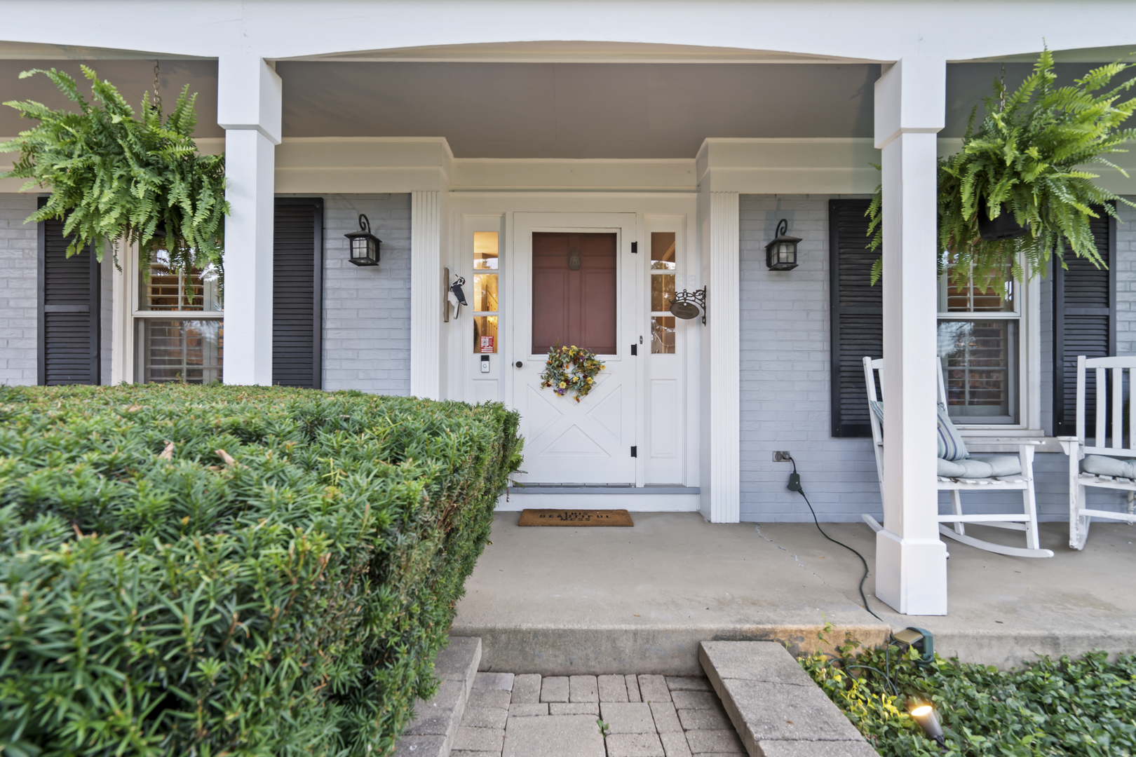 1713 East Thomas Road Wheaton, IL 60187 - Photo 7 of 55 a front view of a house with a yard