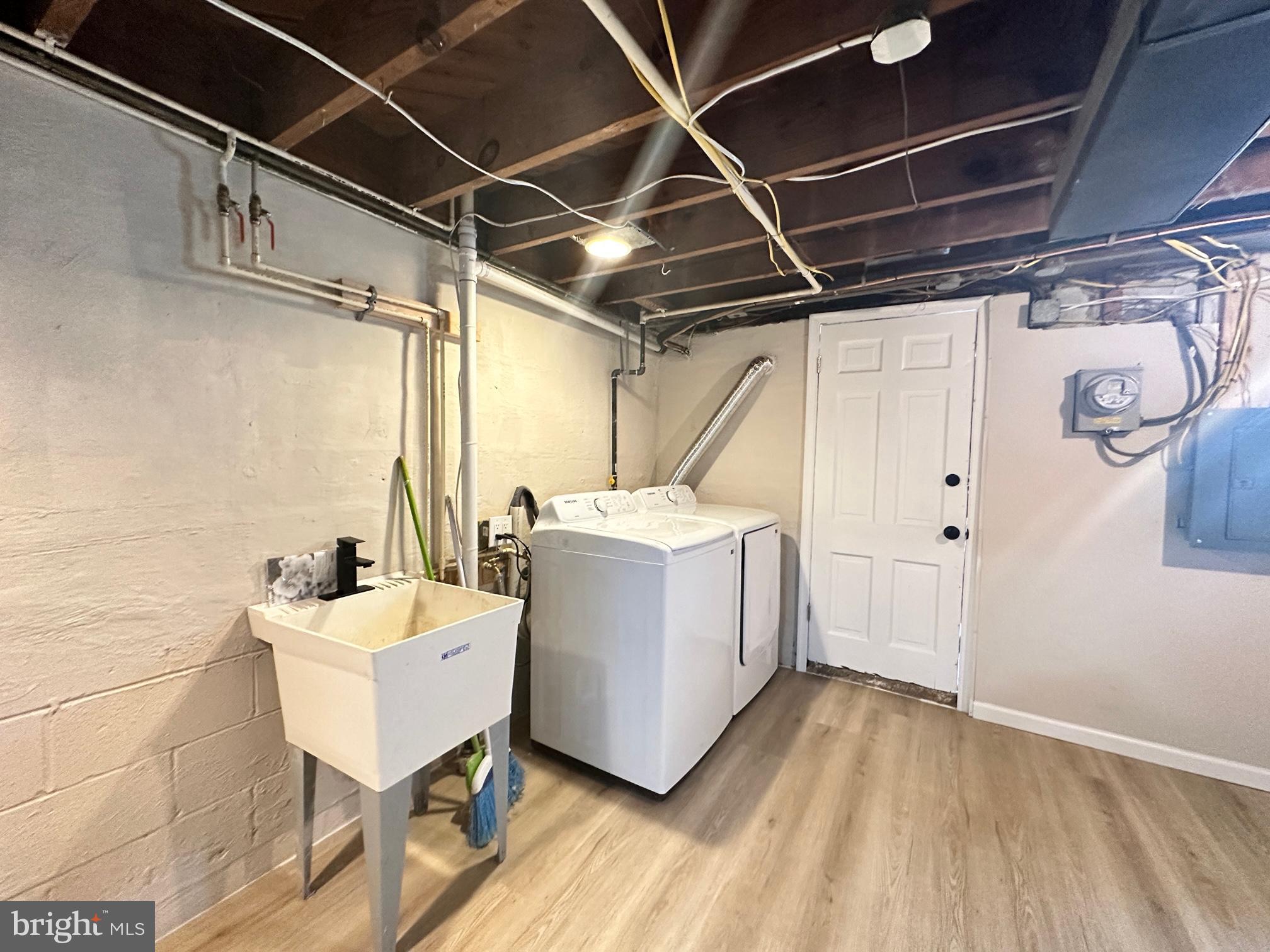 1038 Wedgewood Road Baltimore, MD 21229 - Photo 11 of 12 a utility room with a washer and dryer
