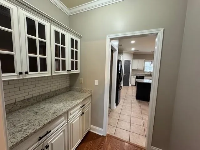 a view of a kitchen cabinets and a counter place