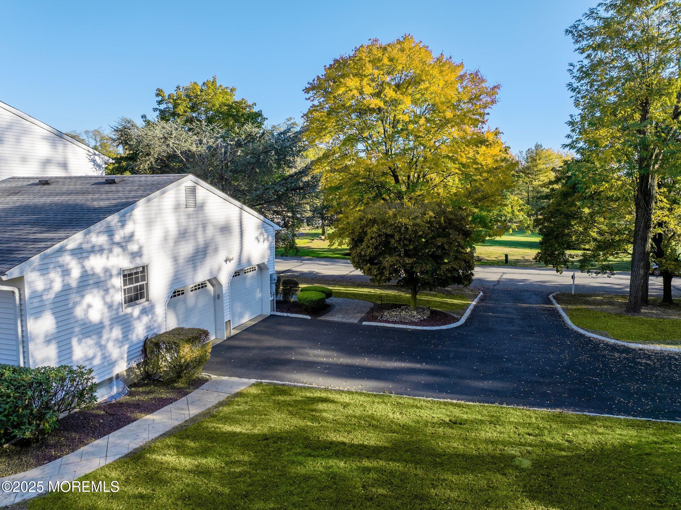 10 Holly Hill Road Marlboro, NJ 07746 - Photo 14 of 19 a view of a park with large trees