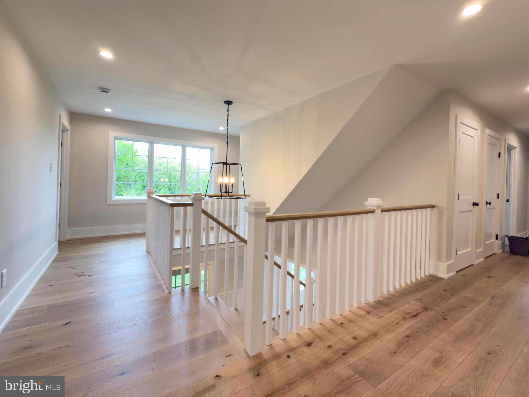 665 Valley View Lane Wayne, PA 19087 - Photo 19 of 34 a view of entryway with stairs and wooden floor