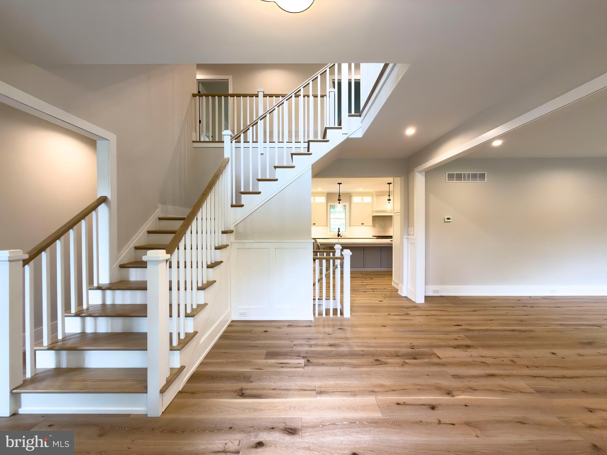 665 Valley View Lane Wayne, PA 19087 - Photo 2 of 34 a view of entryway and hall with wooden floor