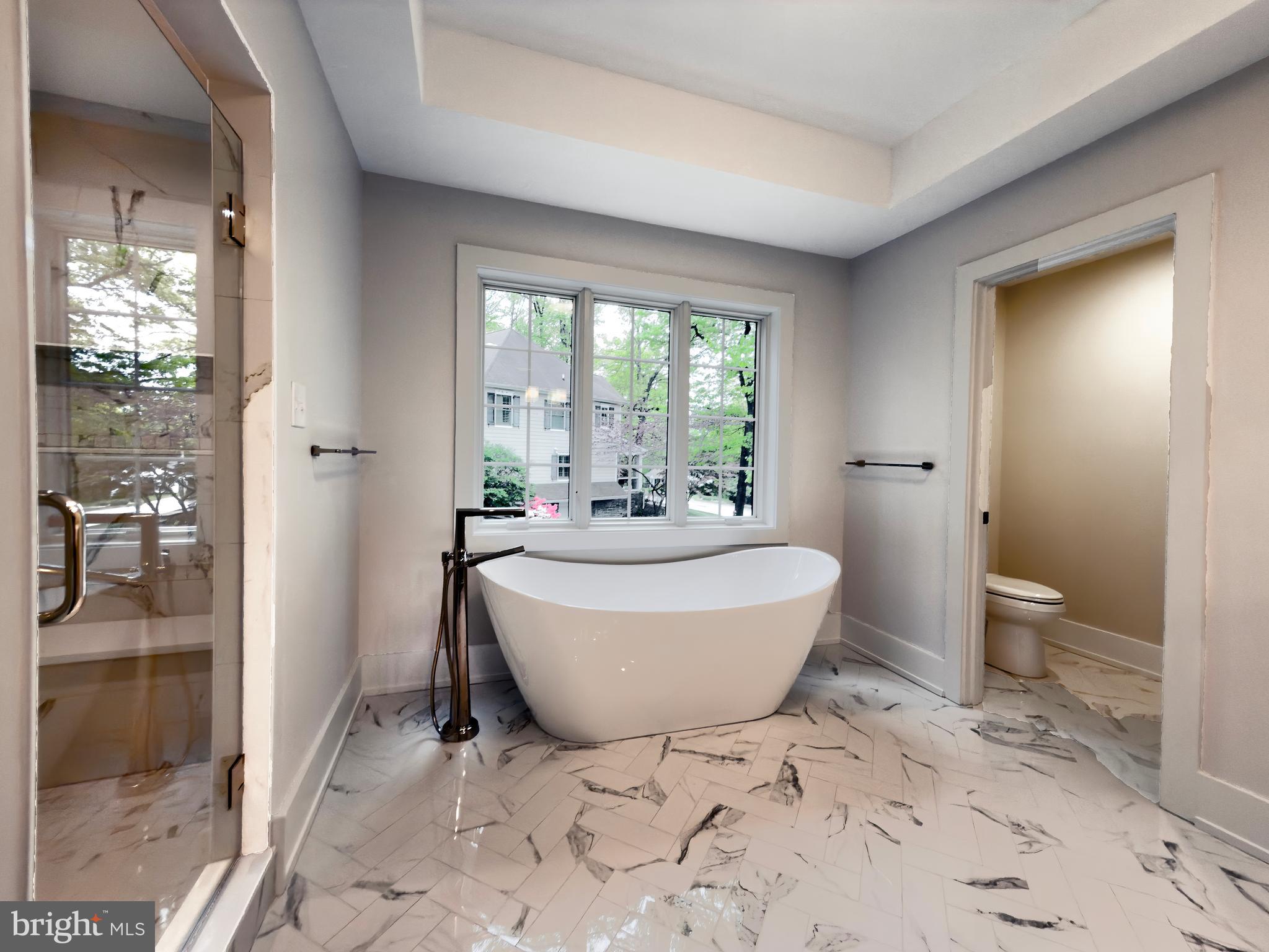 665 Valley View Lane Wayne, PA 19087 - Photo 22 of 34 a spacious bathroom with sink and mirror