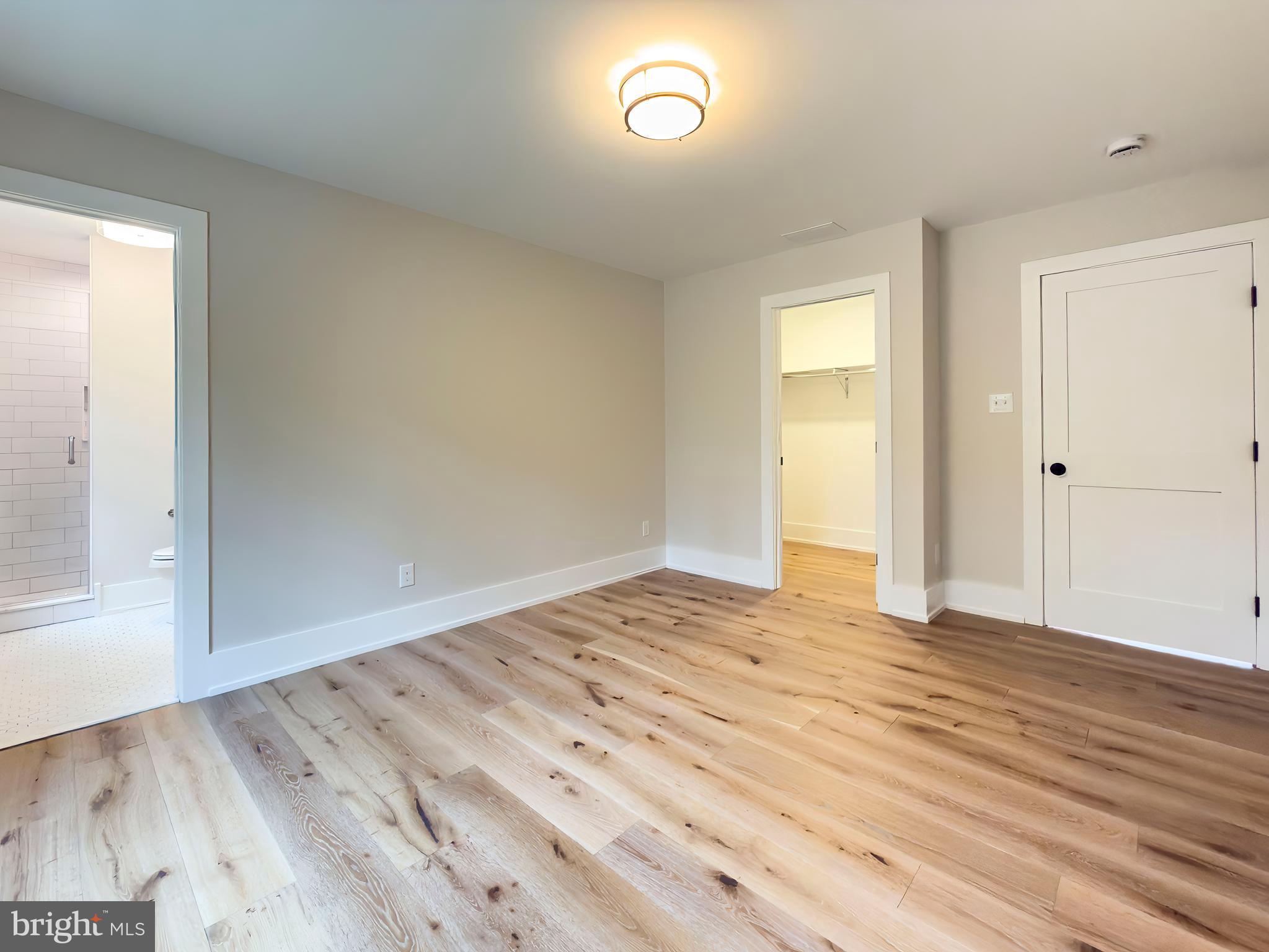 665 Valley View Lane Wayne, PA 19087 - Photo 24 of 34 a view of empty room with wooden floor and fan