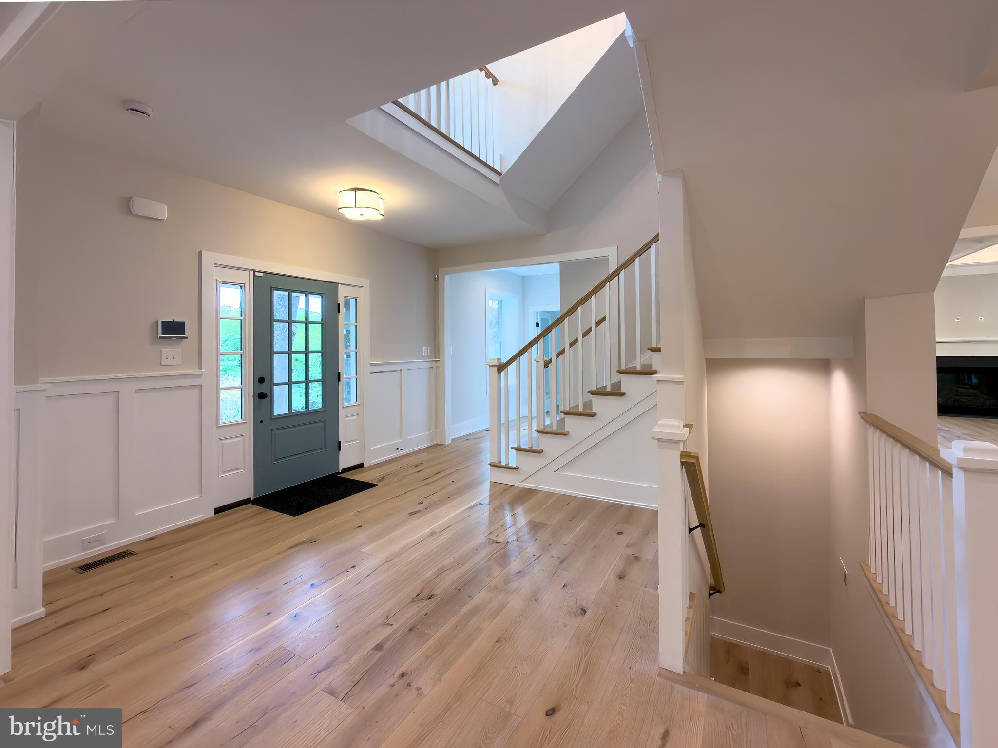 665 Valley View Lane Wayne, PA 19087 - Photo 4 of 34 a view of entryway and hall with wooden floor