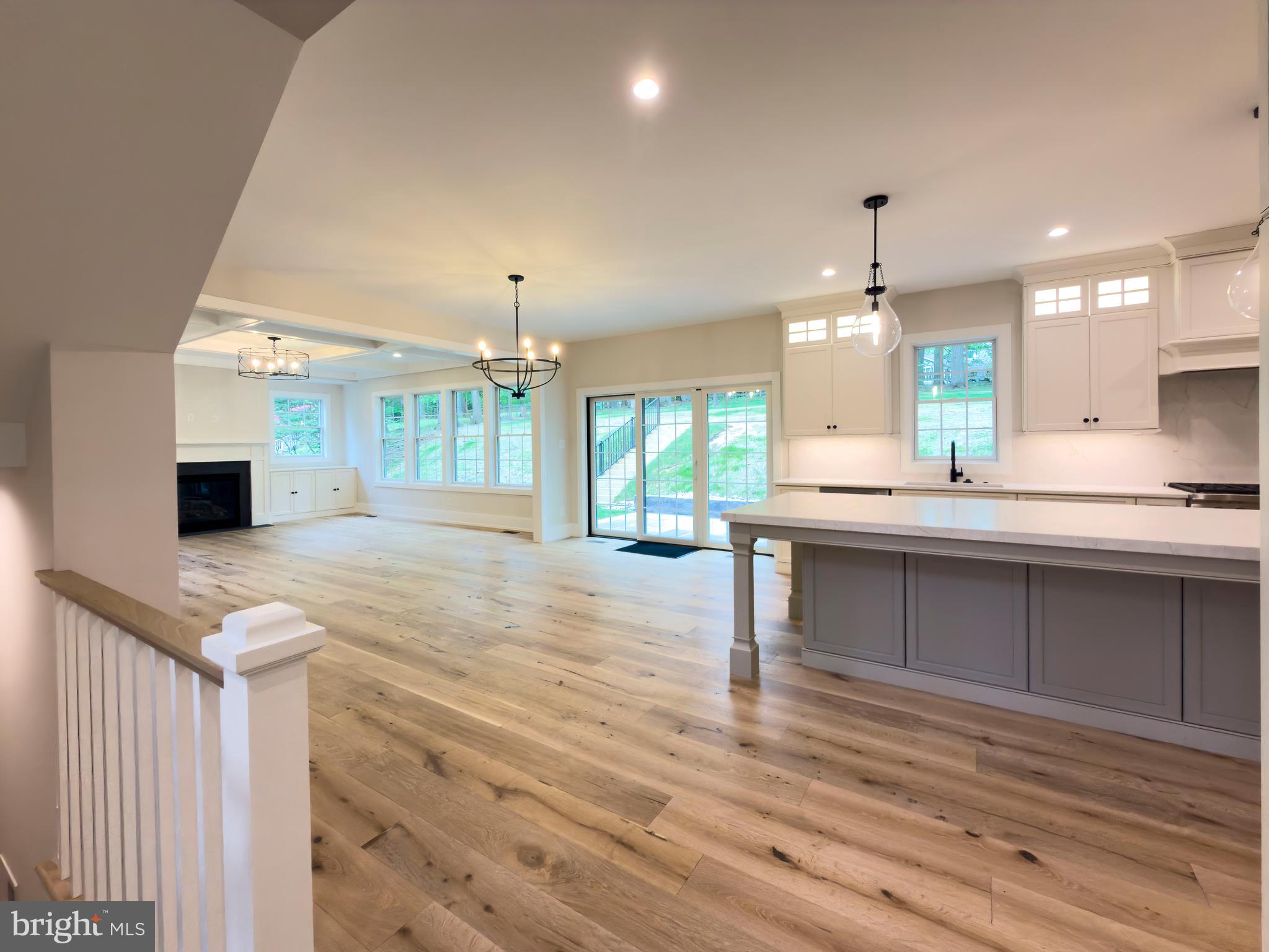 665 Valley View Lane Wayne, PA 19087 - Photo 5 of 34 a kitchen with kitchen island a sink stainless steel appliances and cabinets