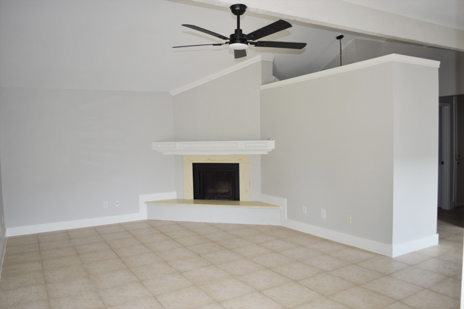 2324 Peppermill Road Houston, TX 77080 - Photo 4 of 20 Cozy living room with a charming fireplace.