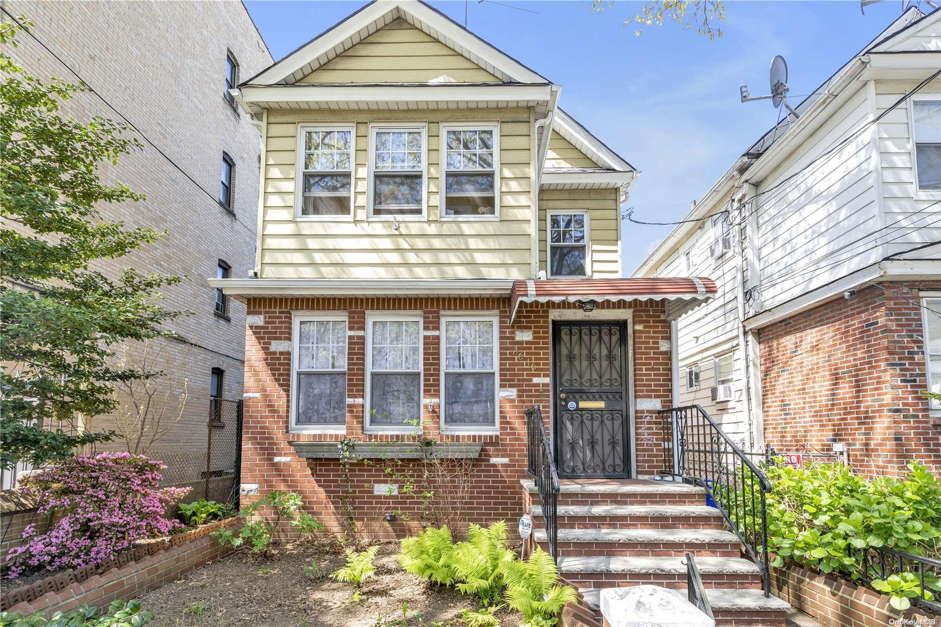 a front view of a house with a porch