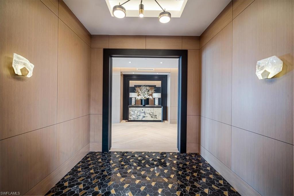 81 Seagate Drive, Unit PH20 Naples, FL 34103 - Photo 27 of 46 a view of a hallway