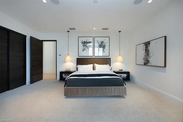 a bathroom with a double vanity sink and mirror