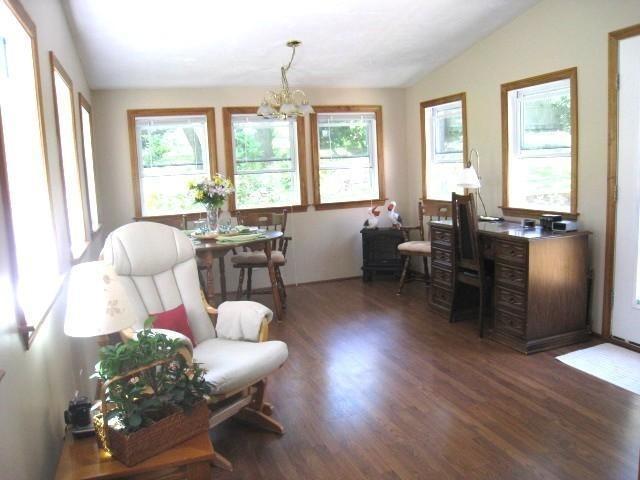 39 Headwaters Road Centerville, MA 02632 - Photo 5 of 5 a living room with furniture and wooden floor