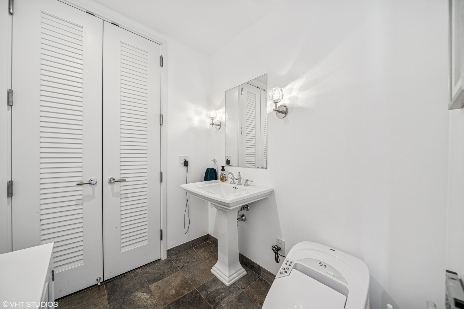 401 North Wabash Avenue, Unit 52C Chicago, IL 60611 - Photo 9 of 20 a bathroom with a sink toilet and shower