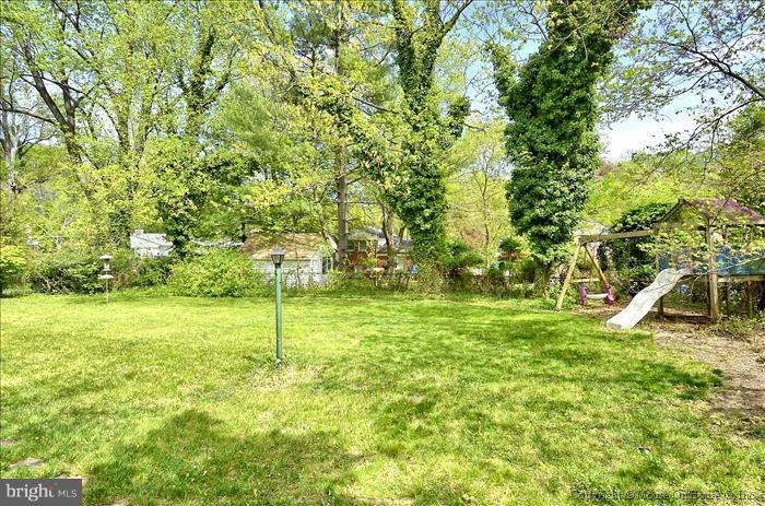 2604 Woodedge Road Silver Spring, MD 20906 - Photo 11 of 30 a view of a backyard with swimming pool