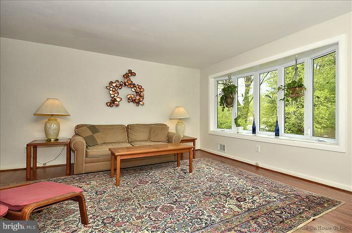 2604 Woodedge Road Silver Spring, MD 20906 - Photo 3 of 30 a living room with furniture and a window