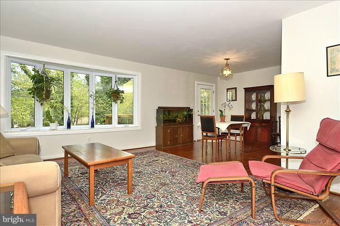 2604 Woodedge Road Silver Spring, MD 20906 - Photo 24 of 30 a living room with furniture and a window